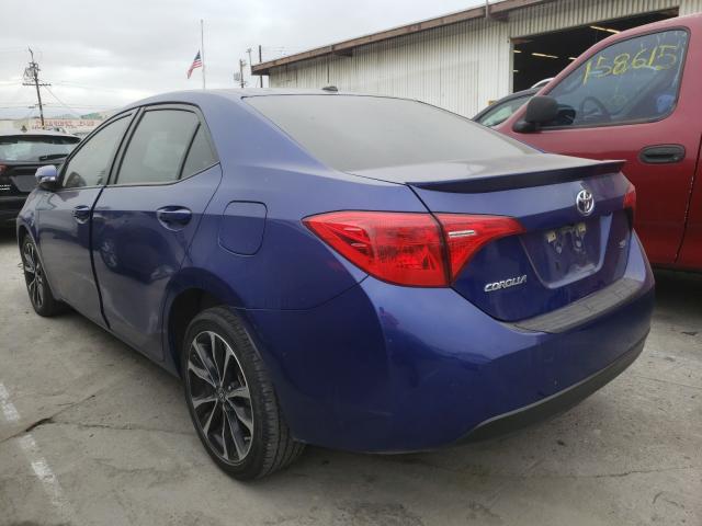 Photo 2 VIN: 5YFBURHE0KP908118 - TOYOTA COROLLA L 