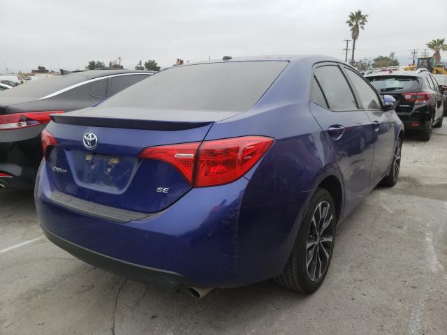 Photo 3 VIN: 5YFBURHE0KP908118 - TOYOTA COROLLA L 