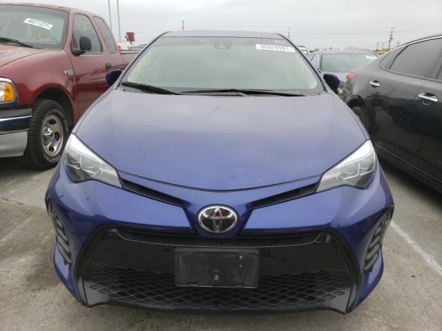 Photo 8 VIN: 5YFBURHE0KP908118 - TOYOTA COROLLA L 