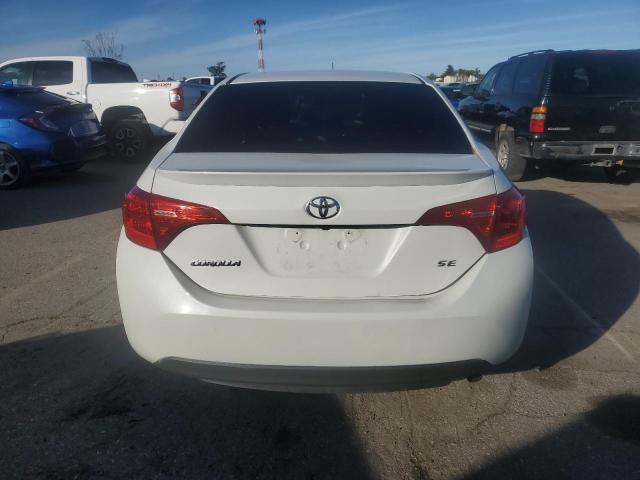 Photo 5 VIN: 5YFBURHE0KP908345 - TOYOTA COROLLA 