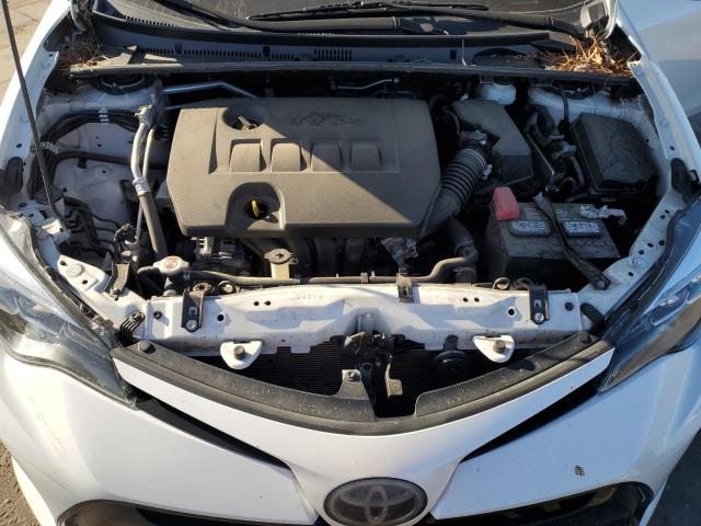 Photo 10 VIN: 5YFBURHE0KP909494 - TOYOTA COROLLA 