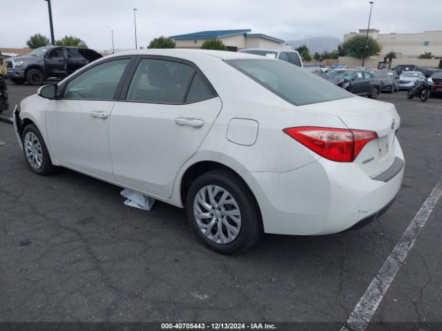 Photo 2 VIN: 5YFBURHE0KP910967 - TOYOTA COROLLA 