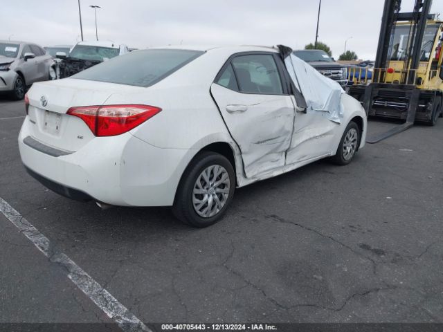 Photo 3 VIN: 5YFBURHE0KP910967 - TOYOTA COROLLA 