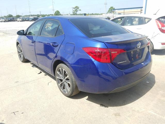 Photo 2 VIN: 5YFBURHE0KP911567 - TOYOTA COROLLA L 