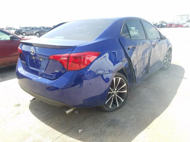 Photo 3 VIN: 5YFBURHE0KP911567 - TOYOTA COROLLA L 