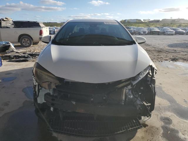 Photo 4 VIN: 5YFBURHE0KP914159 - TOYOTA COROLLA L 