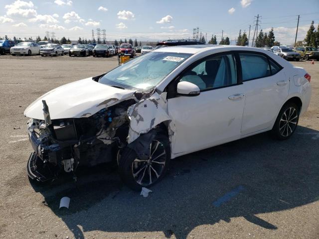 Photo 0 VIN: 5YFBURHE0KP915621 - TOYOTA COROLLA L 