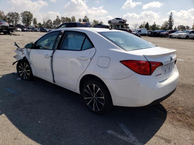 Photo 1 VIN: 5YFBURHE0KP915621 - TOYOTA COROLLA L 