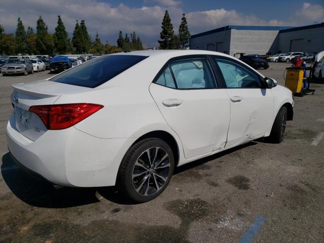 Photo 2 VIN: 5YFBURHE0KP915621 - TOYOTA COROLLA L 