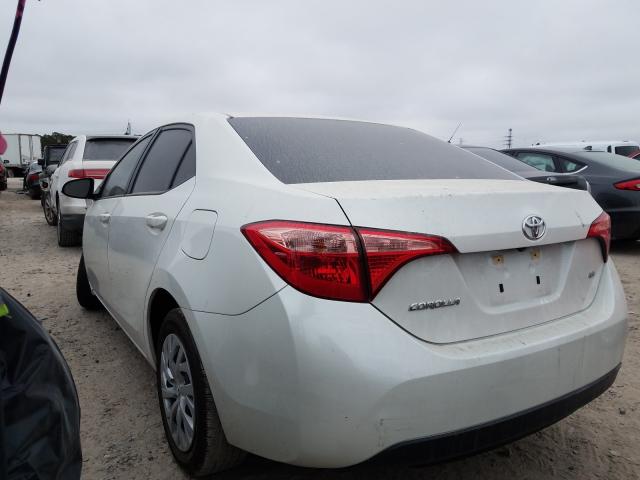 Photo 2 VIN: 5YFBURHE0KP917501 - TOYOTA COROLLA L 