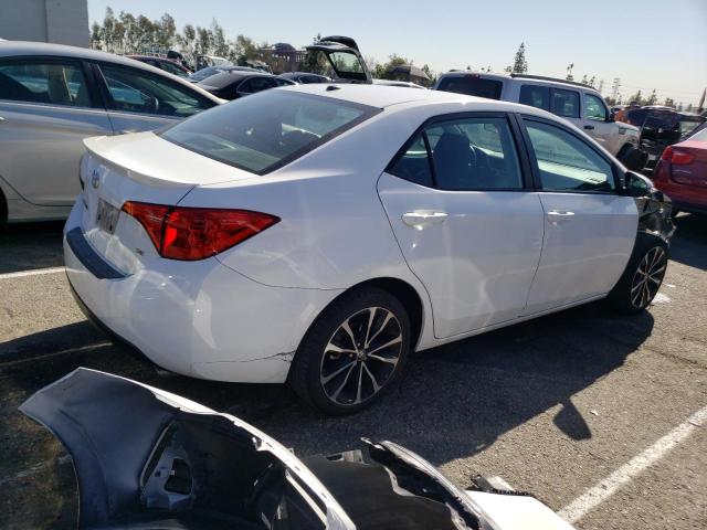 Photo 2 VIN: 5YFBURHE0KP926571 - TOYOTA COROLLA L 