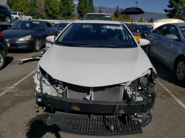 Photo 4 VIN: 5YFBURHE0KP926571 - TOYOTA COROLLA L 