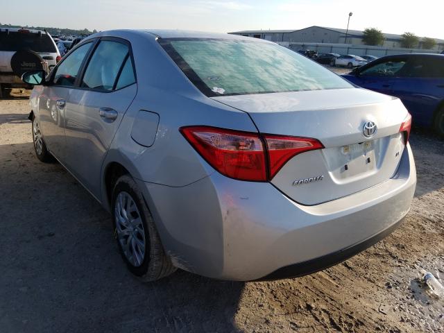 Photo 2 VIN: 5YFBURHE0KP933293 - TOYOTA COROLLA L 