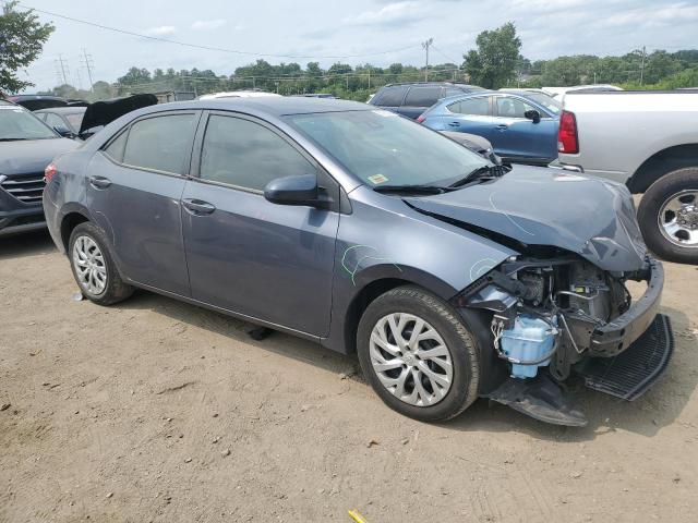 Photo 3 VIN: 5YFBURHE0KP940163 - TOYOTA COROLLA L 