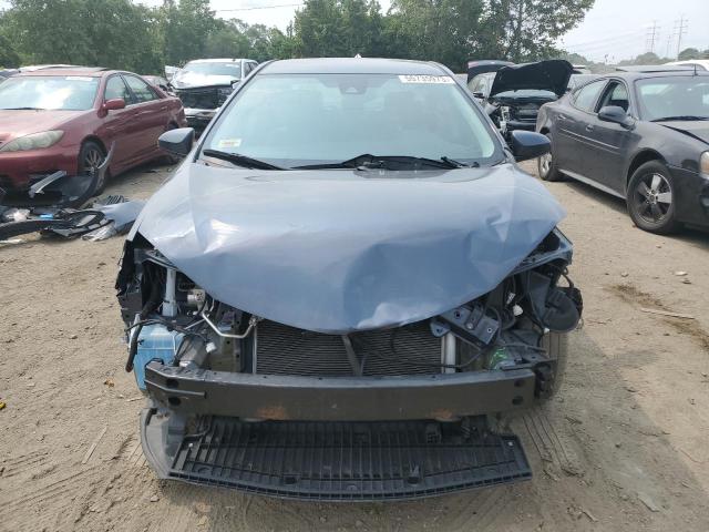 Photo 4 VIN: 5YFBURHE0KP940163 - TOYOTA COROLLA L 