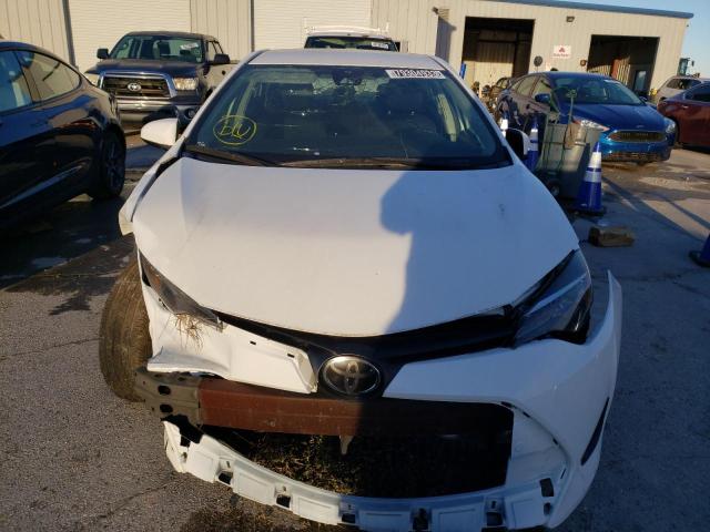 Photo 4 VIN: 5YFBURHE0KP940518 - TOYOTA COROLLA 