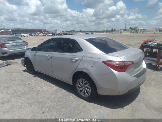 Photo 2 VIN: 5YFBURHE0KP945573 - TOYOTA COROLLA 