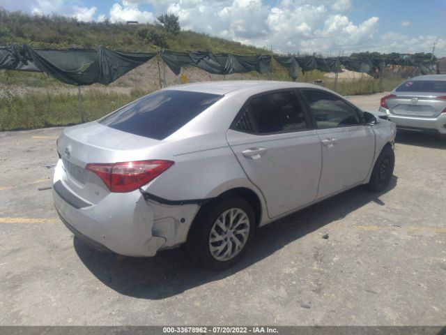 Photo 3 VIN: 5YFBURHE0KP945573 - TOYOTA COROLLA 