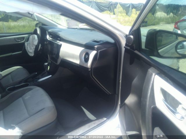 Photo 4 VIN: 5YFBURHE0KP945573 - TOYOTA COROLLA 