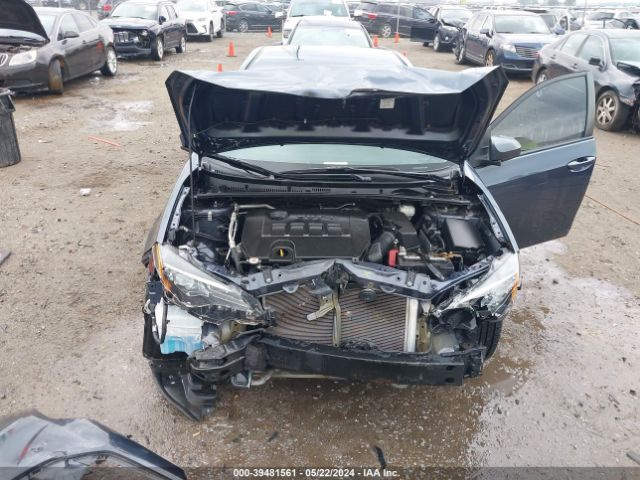 Photo 9 VIN: 5YFBURHE0KP946416 - TOYOTA COROLLA 