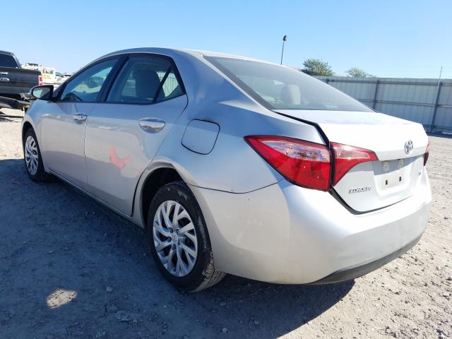 Photo 2 VIN: 5YFBURHE0KP946934 - TOYOTA COROLLA L 