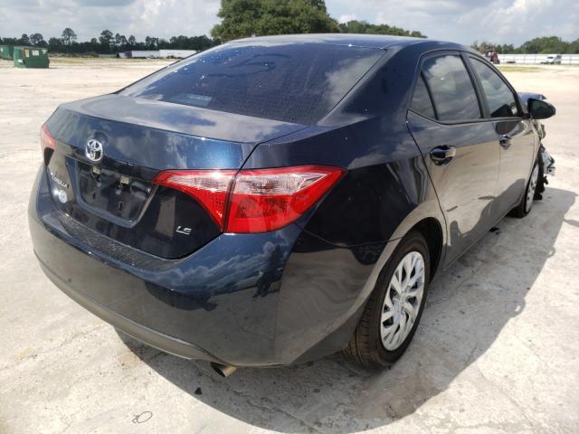 Photo 3 VIN: 5YFBURHE0KP949445 - TOYOTA COROLLA L 