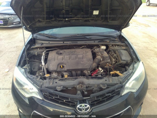 Photo 9 VIN: 5YFBURHE1EP014701 - TOYOTA COROLLA 