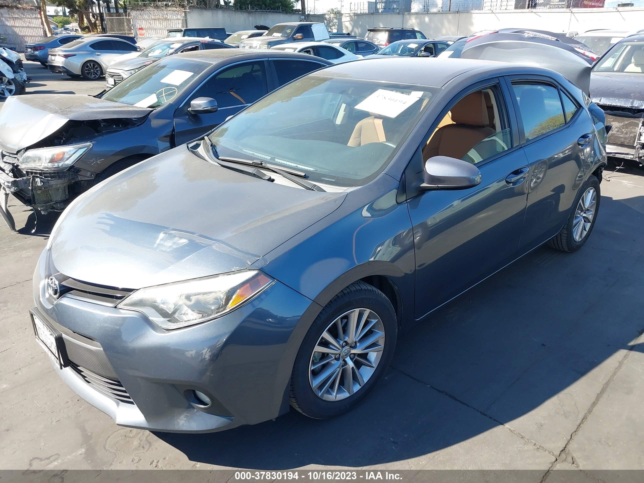 Photo 1 VIN: 5YFBURHE1EP047374 - TOYOTA COROLLA 