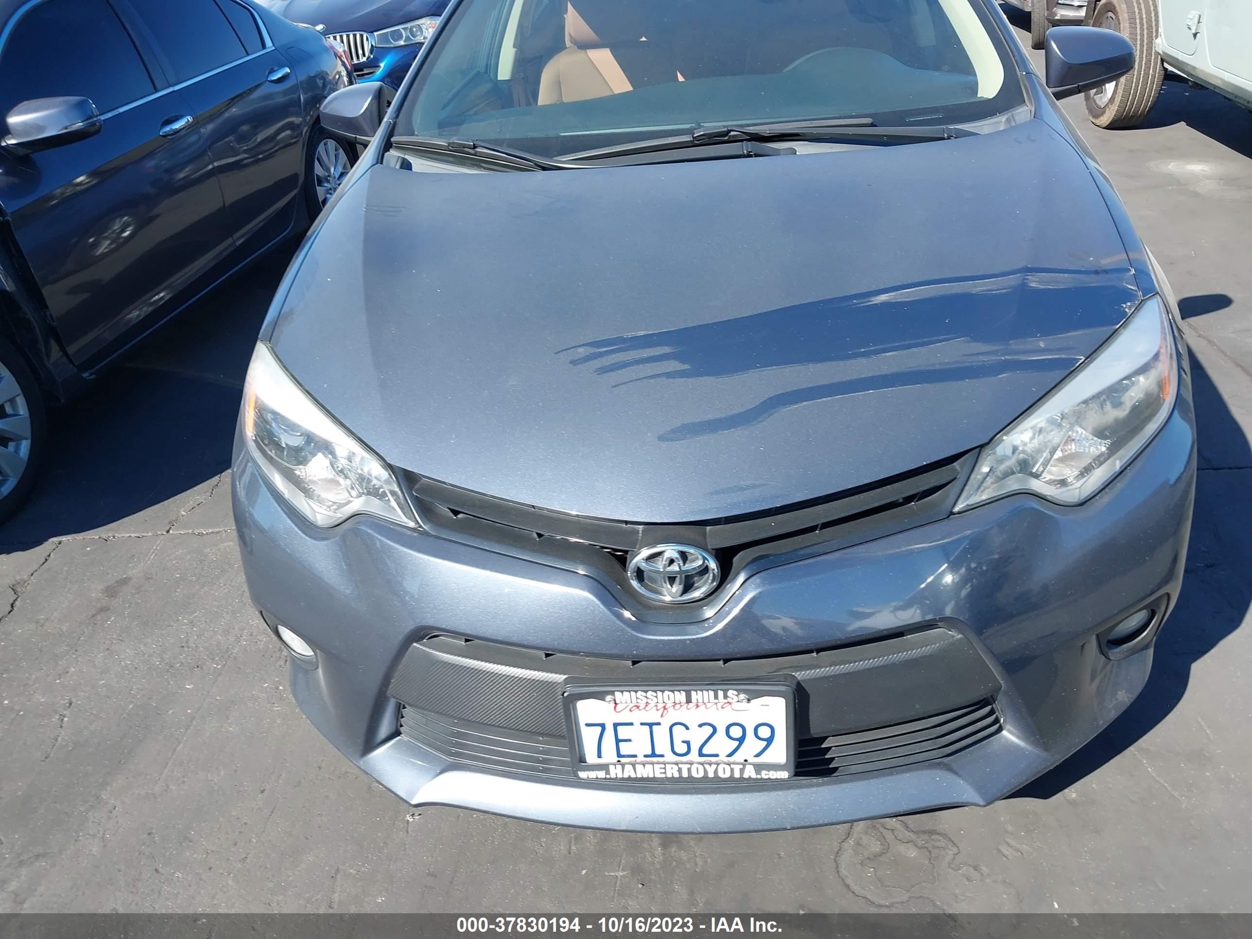 Photo 12 VIN: 5YFBURHE1EP047374 - TOYOTA COROLLA 