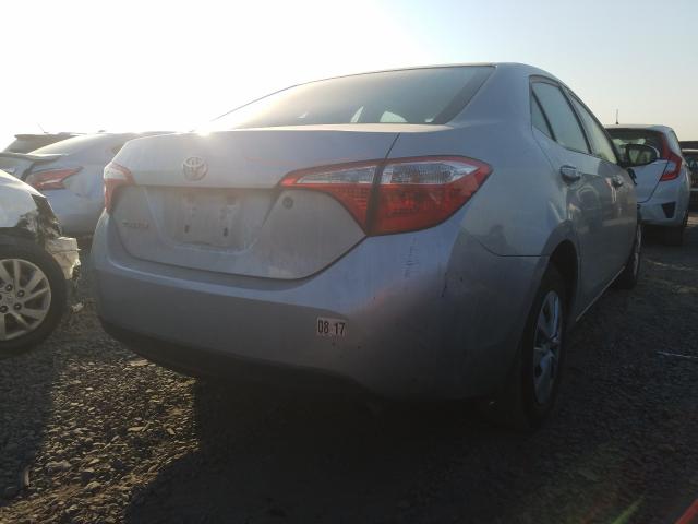 Photo 3 VIN: 5YFBURHE1EP052848 - TOYOTA COROLLA L 