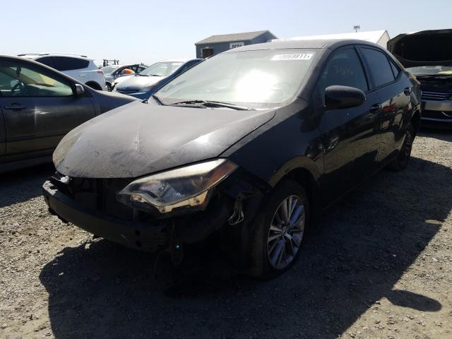 Photo 1 VIN: 5YFBURHE1EP060285 - TOYOTA COROLLA L 