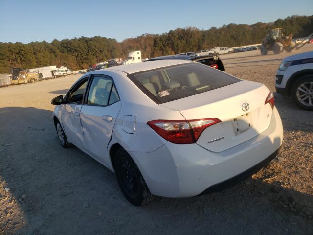 Photo 2 VIN: 5YFBURHE1EP097675 - TOYOTA COROLLA L 