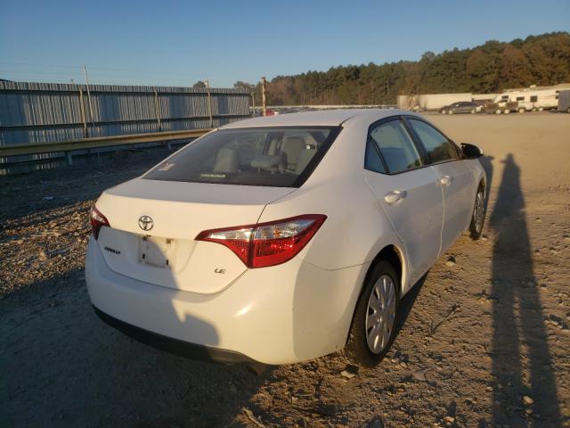 Photo 3 VIN: 5YFBURHE1EP097675 - TOYOTA COROLLA L 