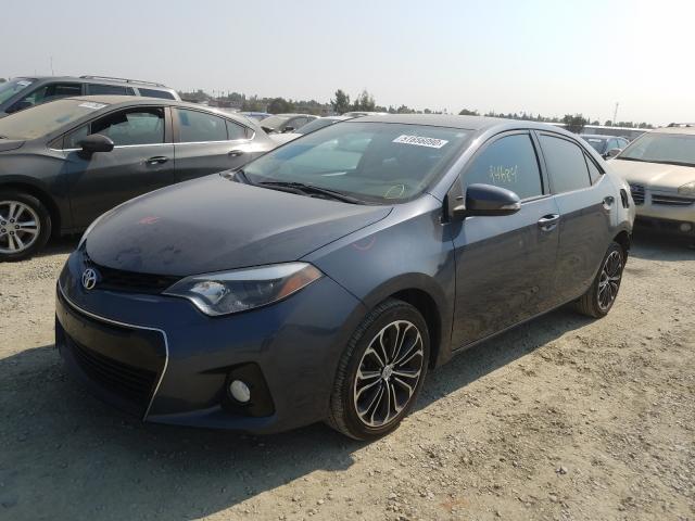 Photo 1 VIN: 5YFBURHE1EP098258 - TOYOTA COROLLA L 