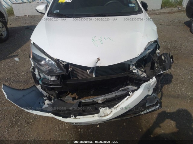 Photo 5 VIN: 5YFBURHE1EP100848 - TOYOTA COROLLA 