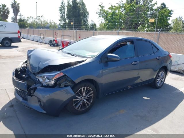 Photo 1 VIN: 5YFBURHE1EP102633 - TOYOTA COROLLA 