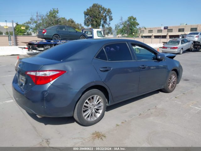 Photo 3 VIN: 5YFBURHE1EP102633 - TOYOTA COROLLA 