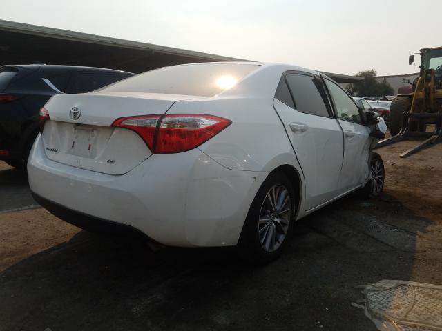 Photo 3 VIN: 5YFBURHE1EP103510 - TOYOTA COROLLA L 