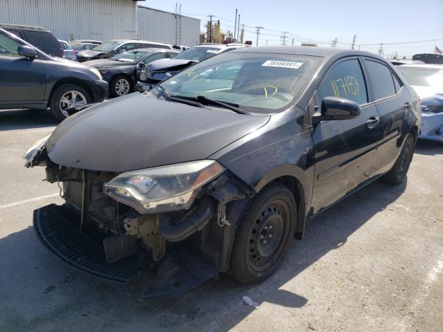 Photo 1 VIN: 5YFBURHE1EP108979 - TOYOTA COROLLA L 