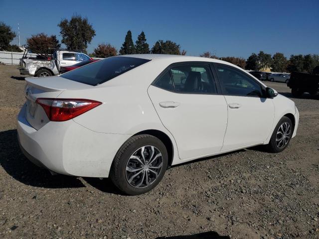 Photo 2 VIN: 5YFBURHE1EP140069 - TOYOTA COROLLA L 