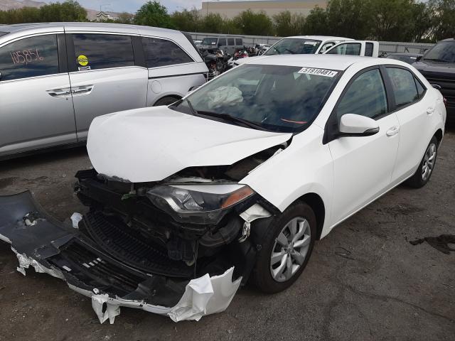 Photo 1 VIN: 5YFBURHE1EP145059 - TOYOTA COROLLA L 