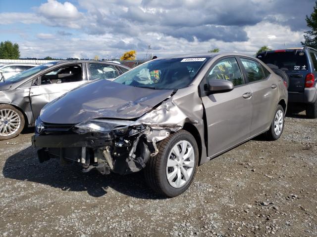 Photo 1 VIN: 5YFBURHE1EP145627 - TOYOTA COROLLA L 