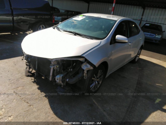 Photo 1 VIN: 5YFBURHE1FP185210 - TOYOTA COROLLA 