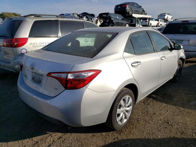 Photo 3 VIN: 5YFBURHE1FP285310 - TOYOTA COROLLA L 