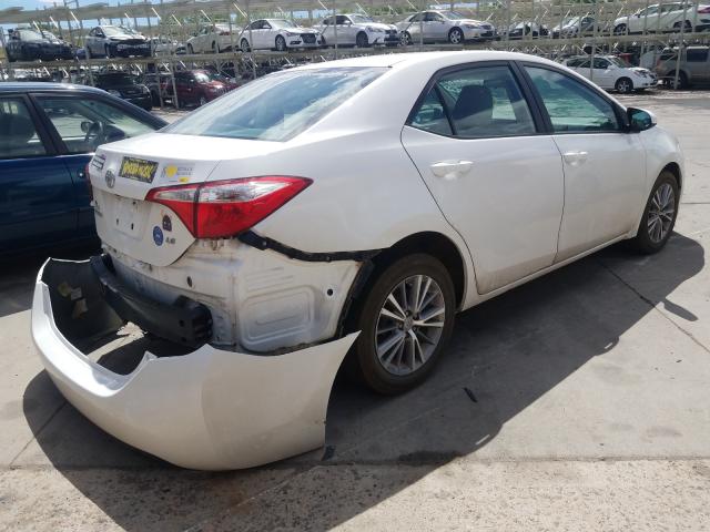 Photo 3 VIN: 5YFBURHE1FP340550 - TOYOTA COROLLA L 