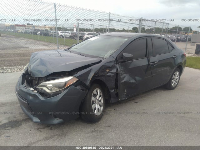 Photo 1 VIN: 5YFBURHE1GP369399 - TOYOTA COROLLA 