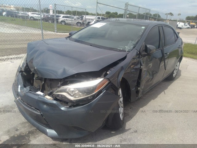 Photo 5 VIN: 5YFBURHE1GP369399 - TOYOTA COROLLA 