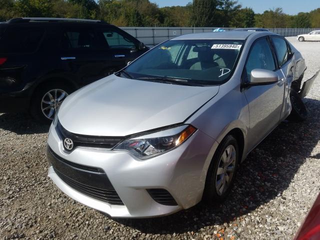 Photo 1 VIN: 5YFBURHE1GP416883 - TOYOTA COROLLA L 