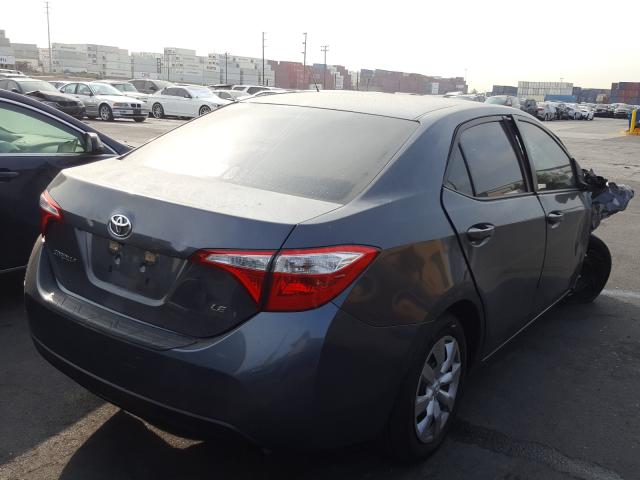 Photo 3 VIN: 5YFBURHE1GP503134 - TOYOTA COROLLA L 