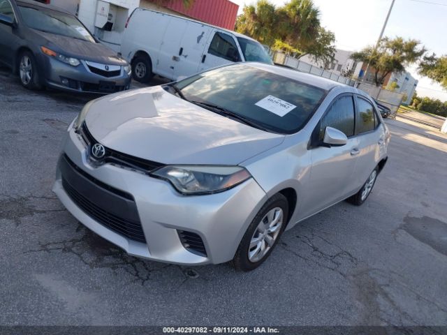 Photo 1 VIN: 5YFBURHE1GP525487 - TOYOTA COROLLA 